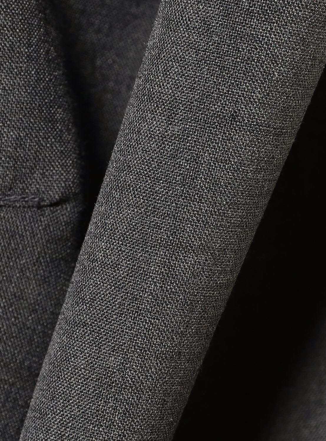 Close-up of textured gray fabric.