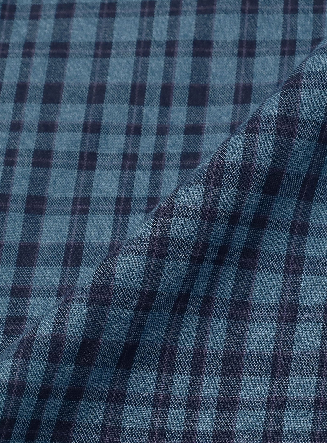 Close-up of blue and purple plaid fabric