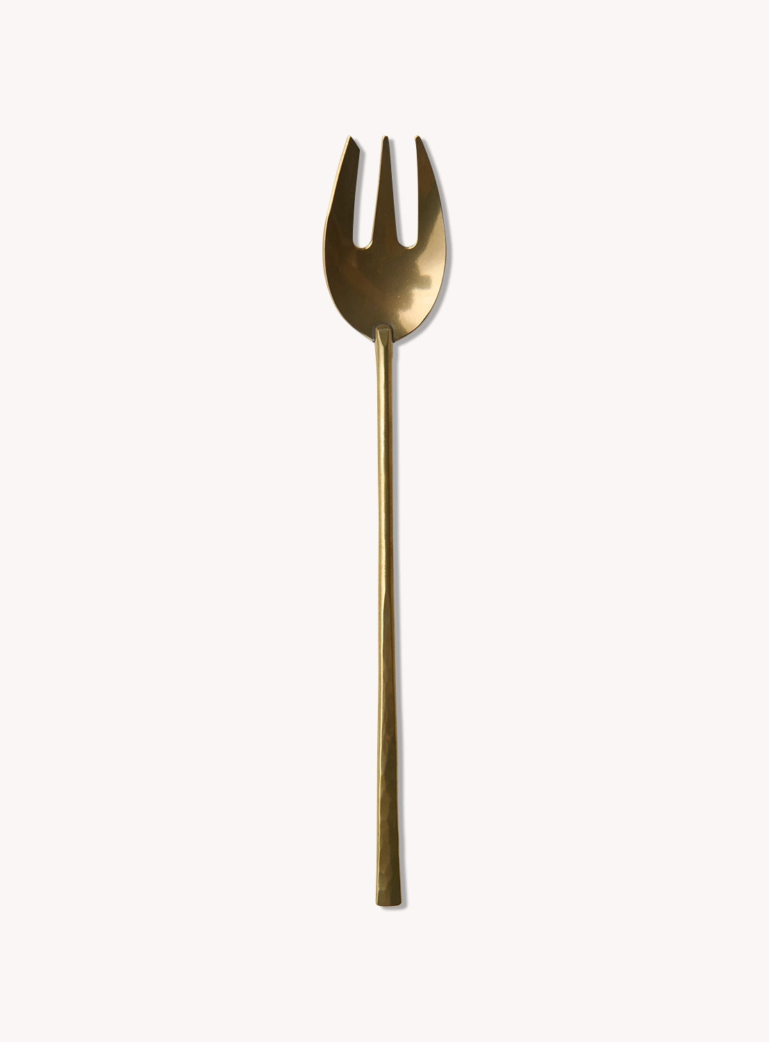 Gold-colored fork.