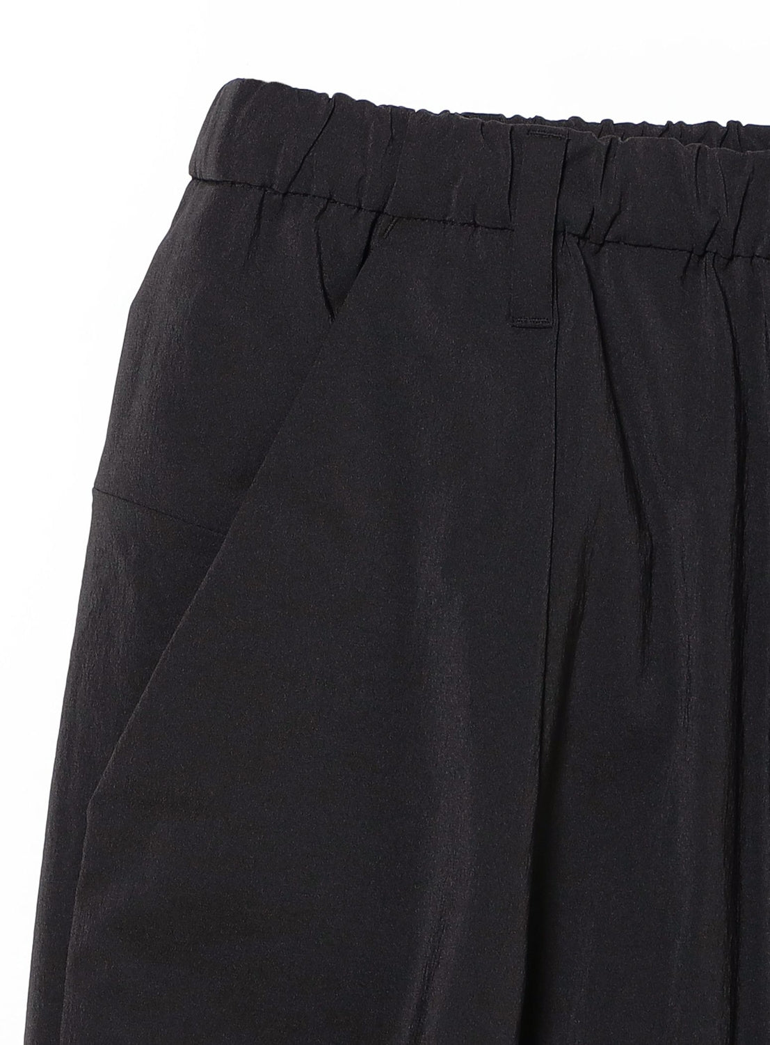Close-up of the waistband and upper section of TEATORA Wallet Pants Resort - Doctoroid in black, showcasing an elastic waistband, belt loops, and side pockets—crafted from innovative DOCTOROID fabric for superior comfort, making them the ideal travel pants.
