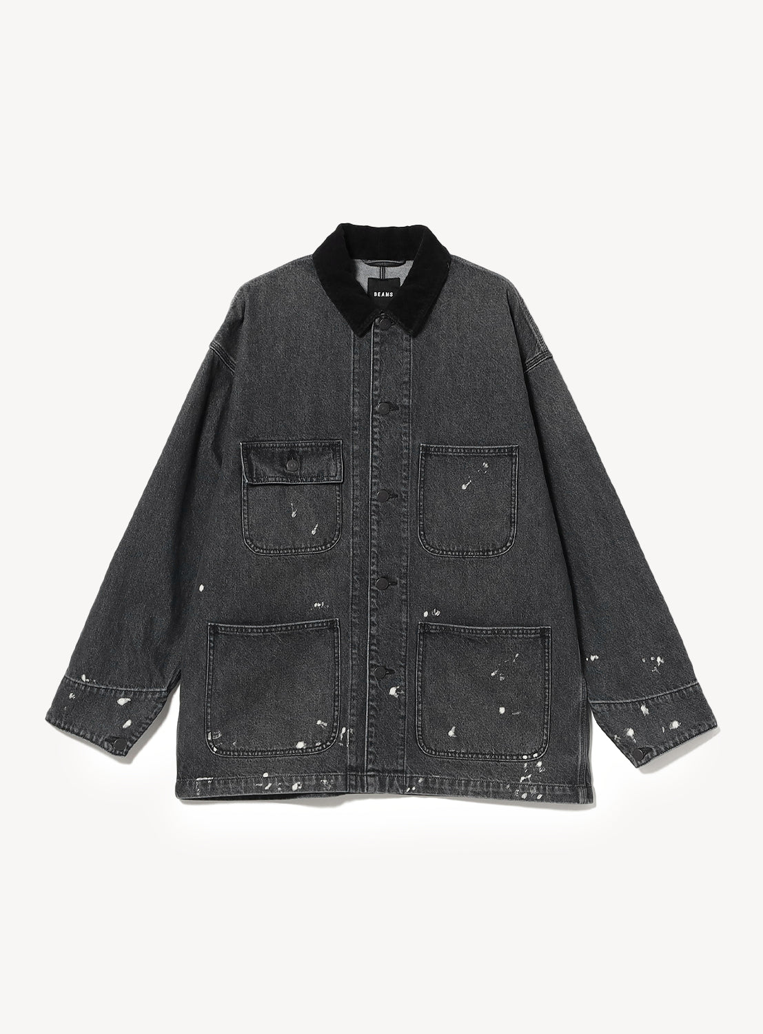 BEAMS Used Denim Coverall in a relaxed fit, featuring a black denim fabric, dark collar, four front pockets, and white paint splatter detailing.