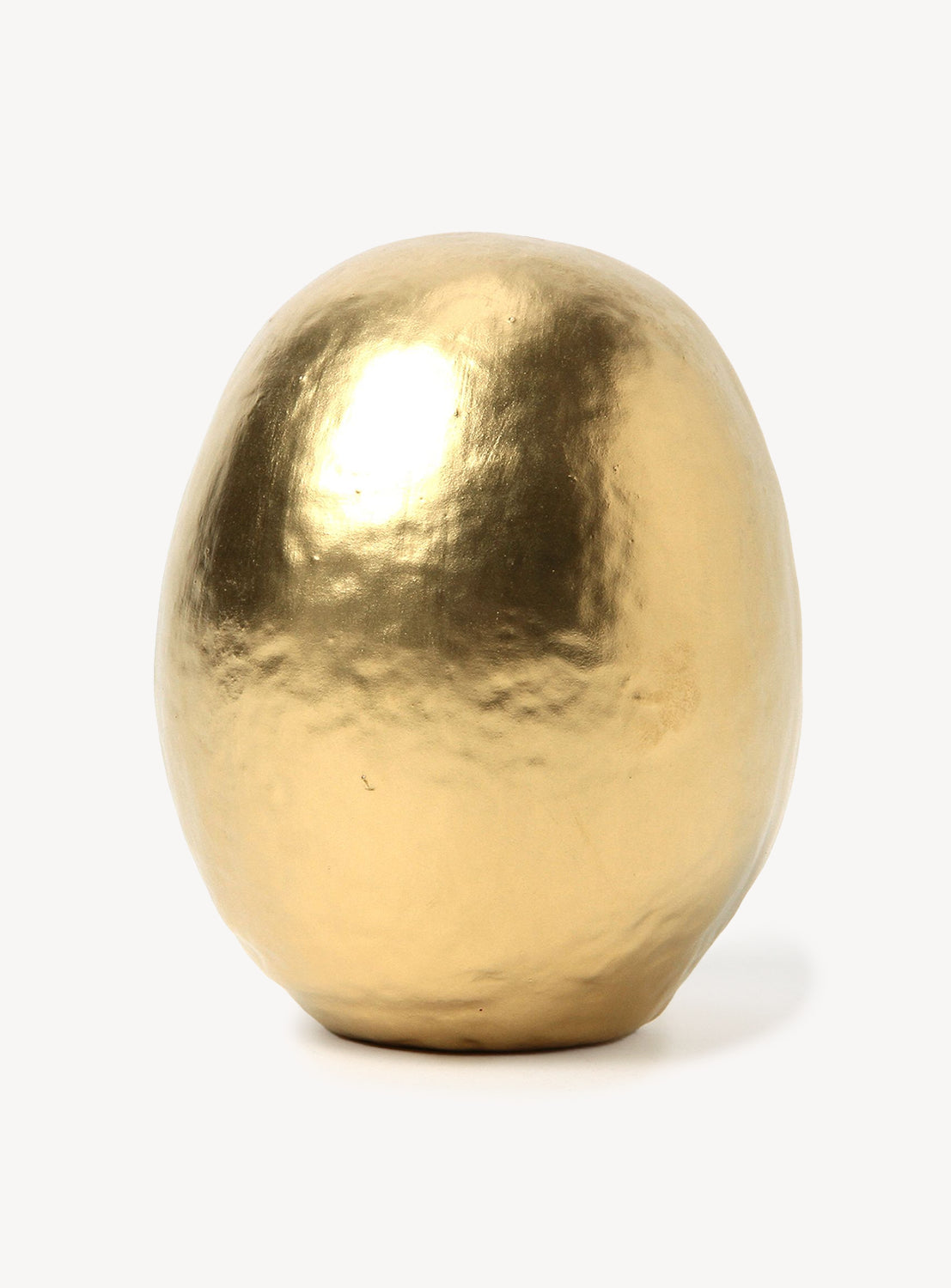 Gold backside of daruma on a white background