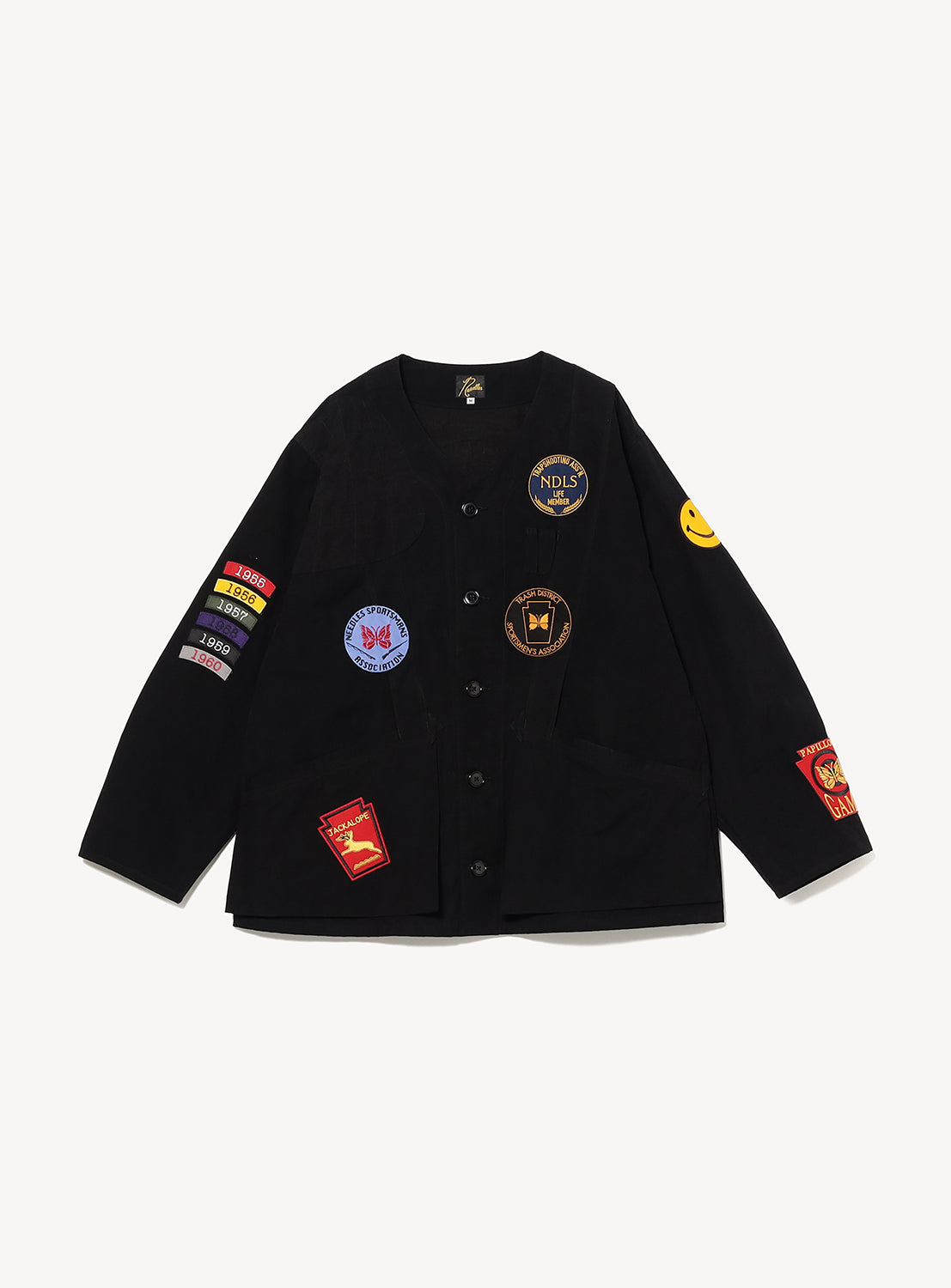 black jacket with patches on a white background