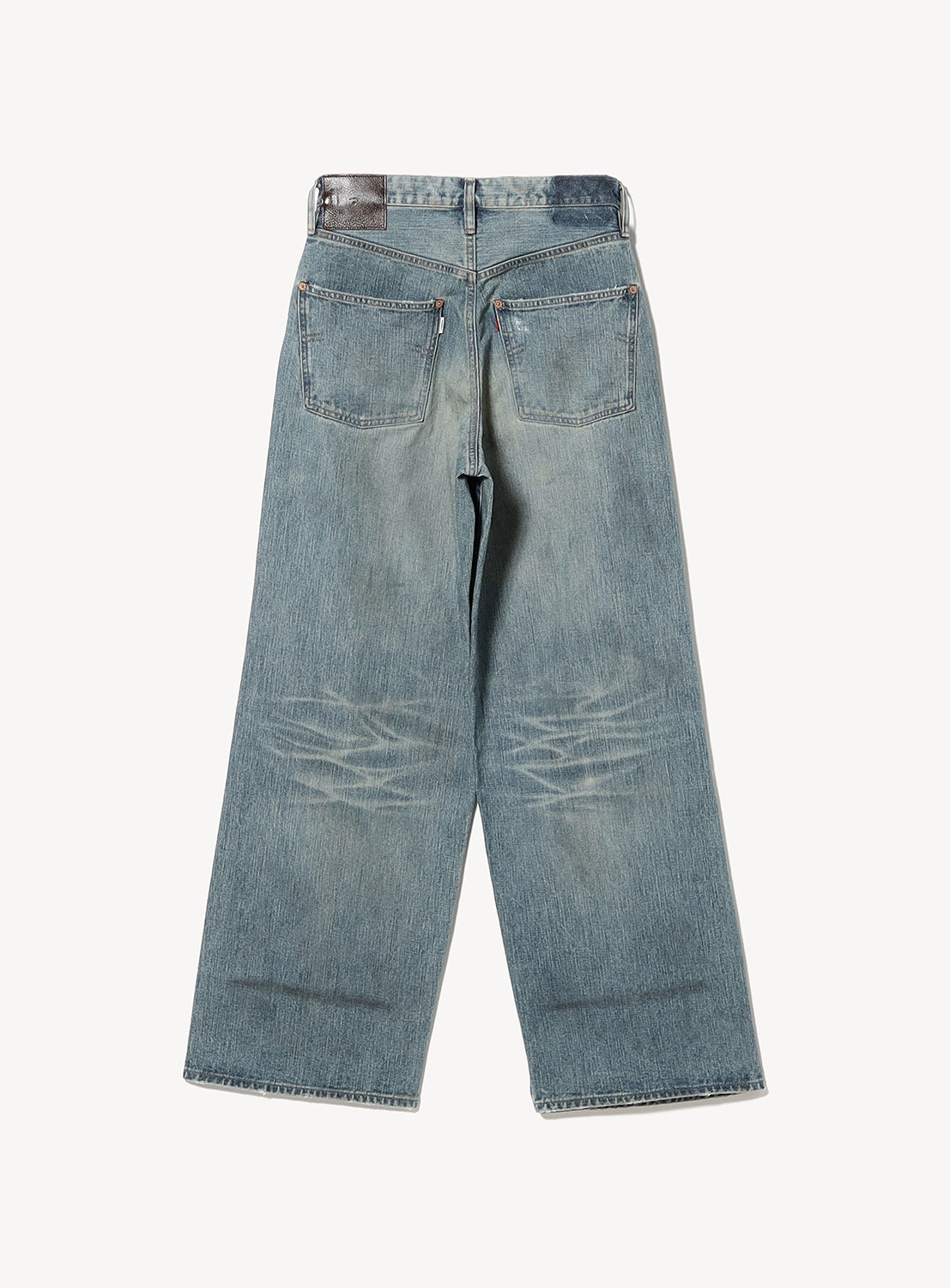 Pair of light blue jeans on a white background