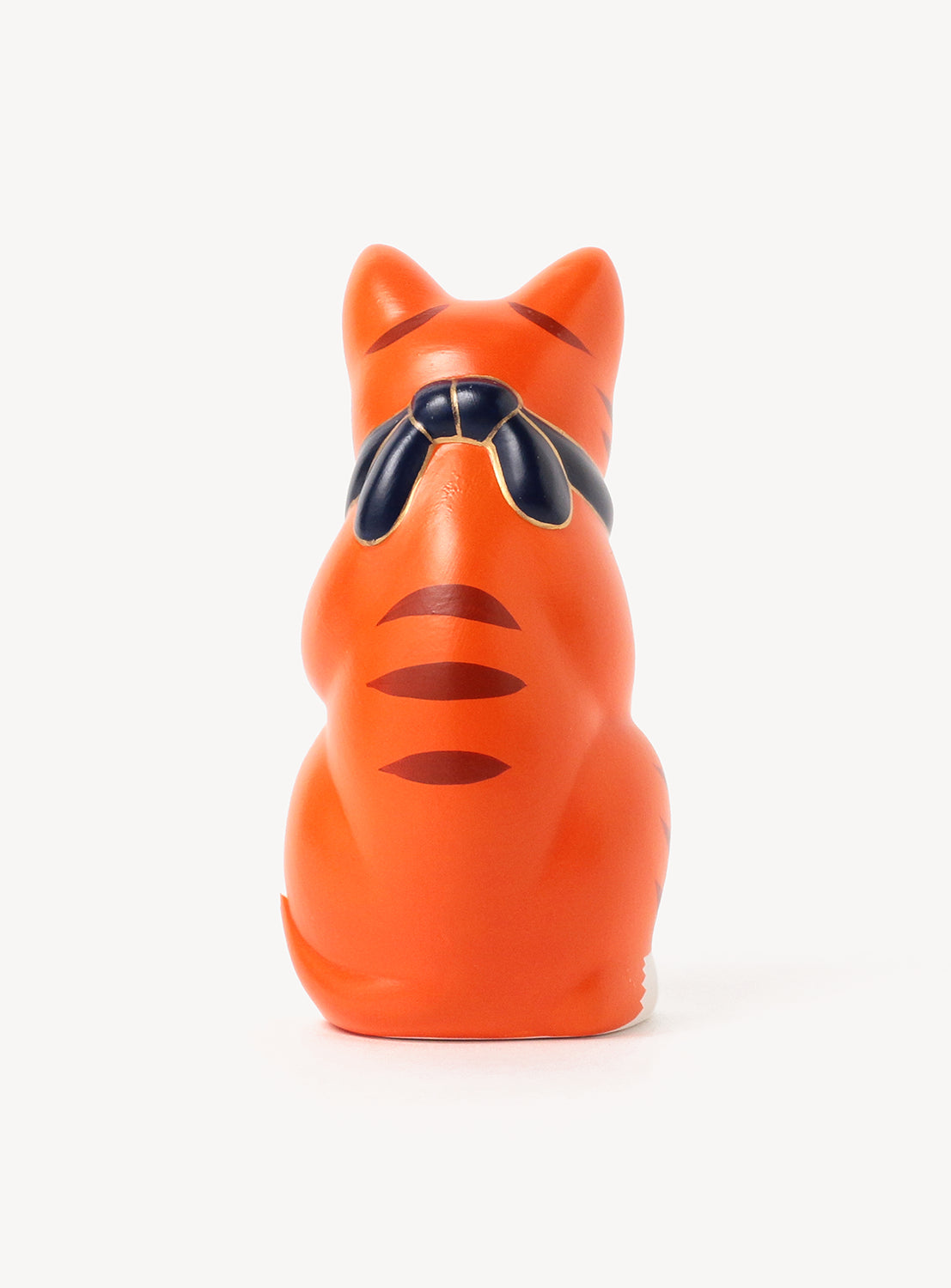 Orange cat-shaped container on a white background