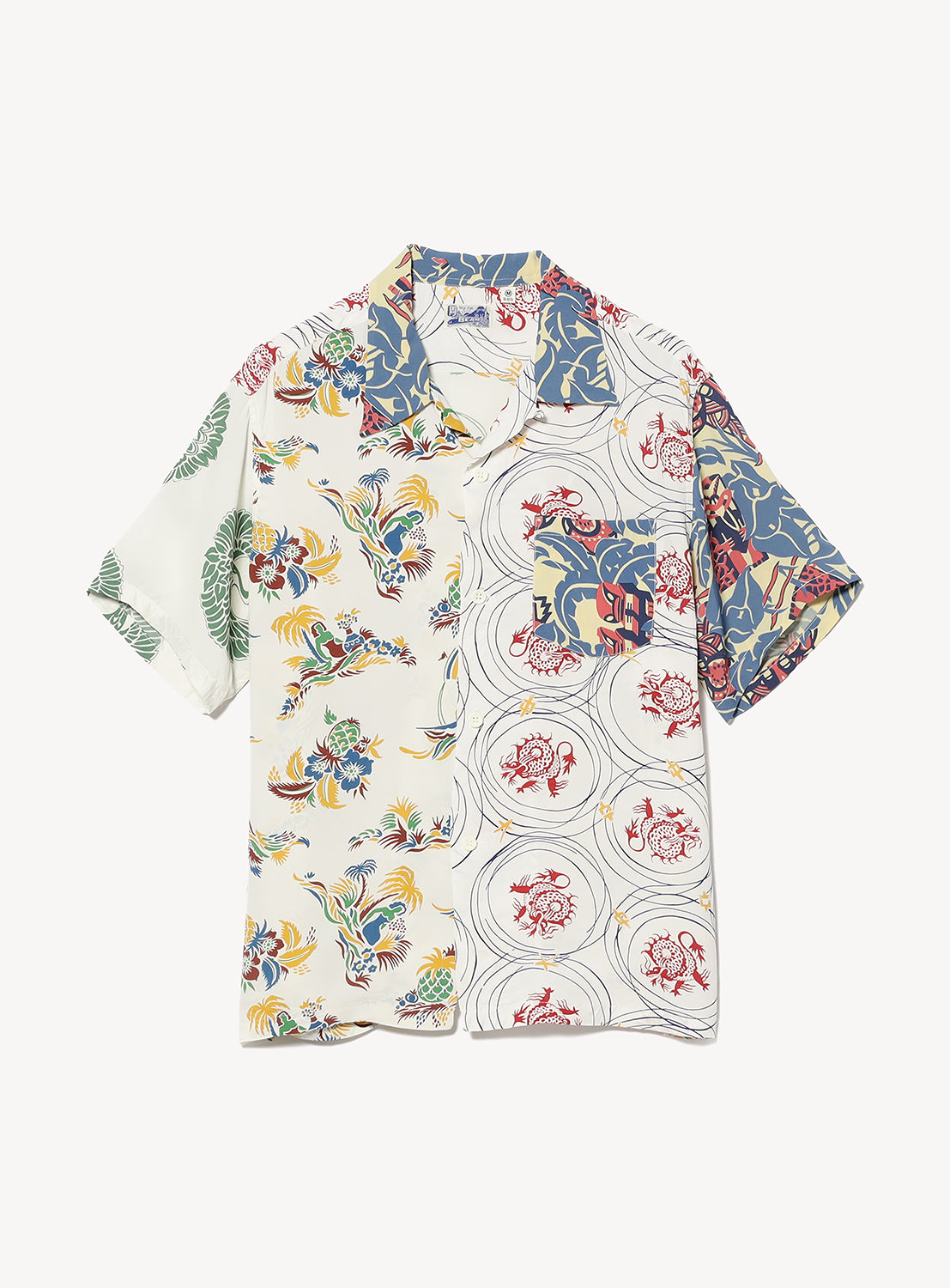 The SUN SURF Exclusive Patchwork Aloha Shirt 26SS features short sleeves and vibrant patchwork with floral, bird, and geometric patterns in white, green, red, blue, and yellow for a vintage-inspired look.
