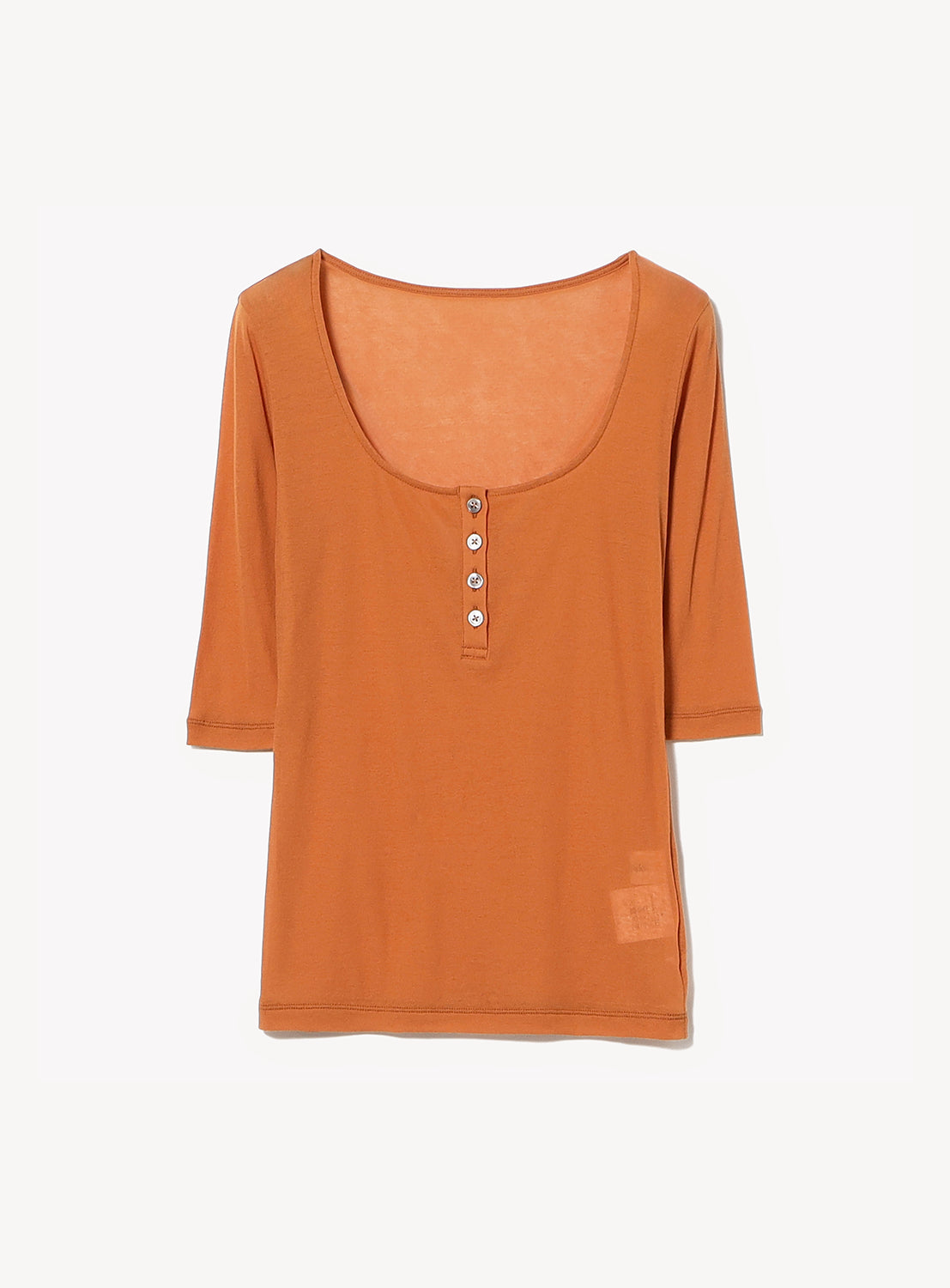 The Ernie Palo Sheer Henley Neck T-Shirt for women is a burnt orange, half-sleeve top with a scoop neckline and five buttons, featuring feminine styling and a lightweight cut-and-sew design, shown on a plain white background.