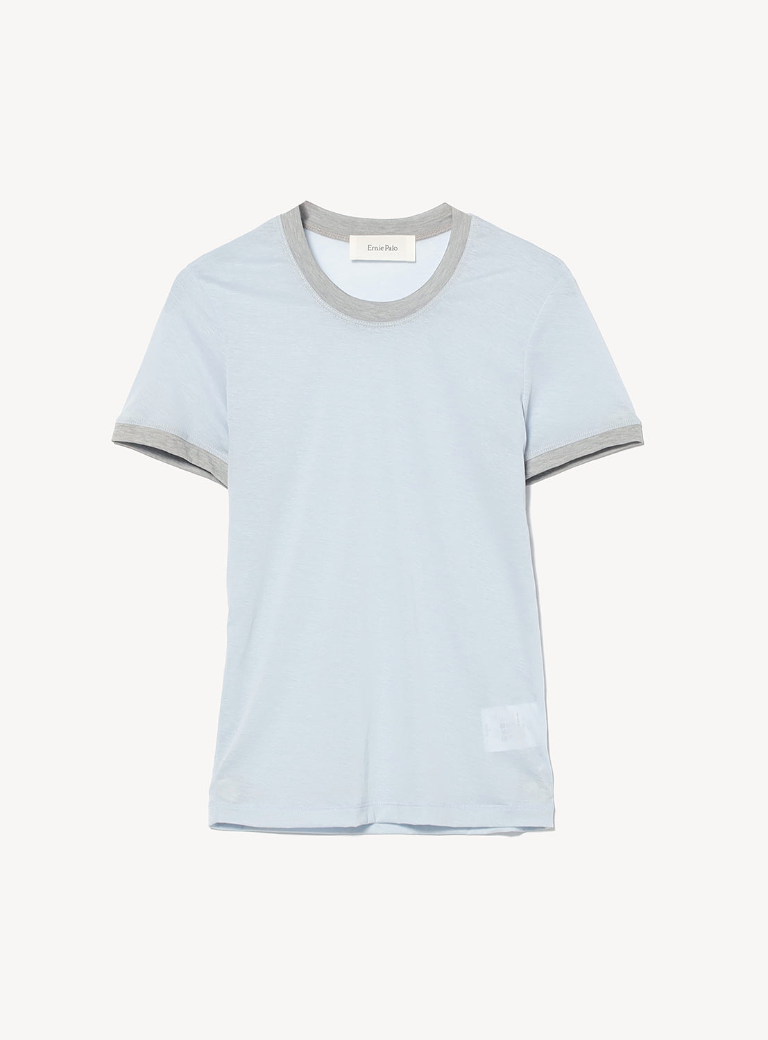 The Ernie Palo Ringer T-shirt features a light blue cotton-nylon blend with gray ribbed collar and sleeve cuffs, shown against a plain white background.