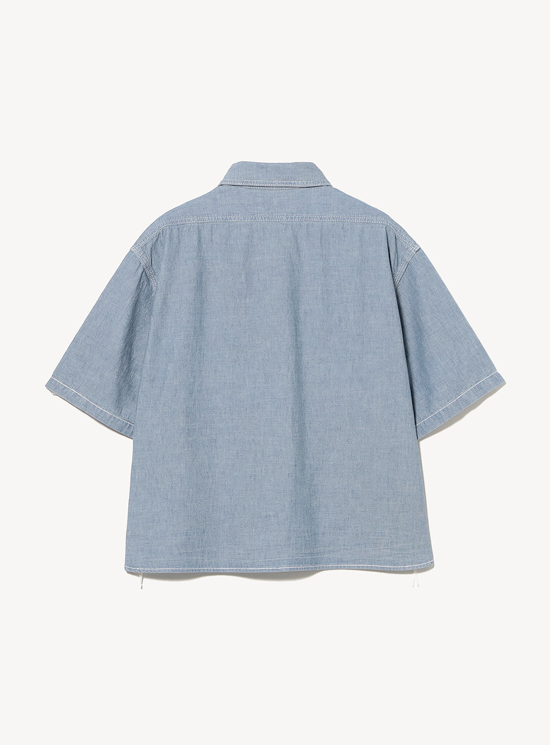 Back view of the BEAMS BOY Chambray Short-Sleeve Work Shirt in light blue, featuring a button-up front, collar, and relaxed fit, displayed against a plain white background.