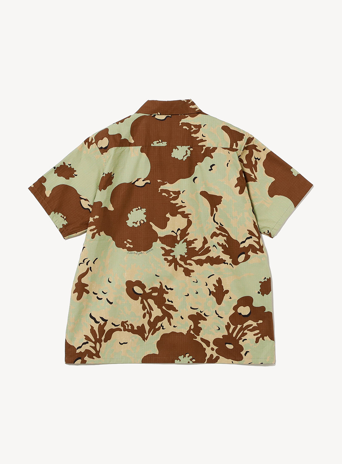 The Camo Flower Open Shirt by NOMARHYTHM TEXTILE is a short-sleeve, breathable cotton button-up featuring a brown and green floral camouflage pattern, shown flat with the back facing up on a white background.