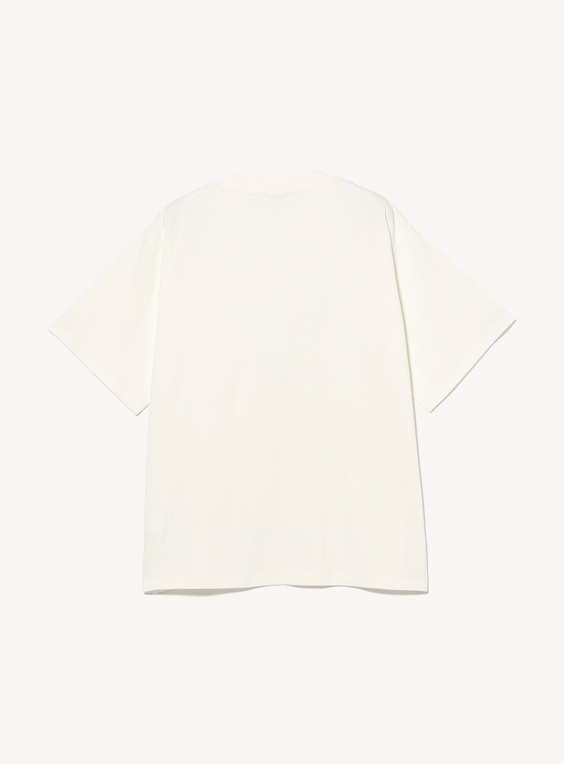 A plain white short-sleeve F-LAGSTUF-F Symbol Logo Tee is laid flat, shown from the back against a white background. Featuring a timeless, vintage-inspired look, this T-shirt has no visible designs, logos, or patterns on the reverse side.