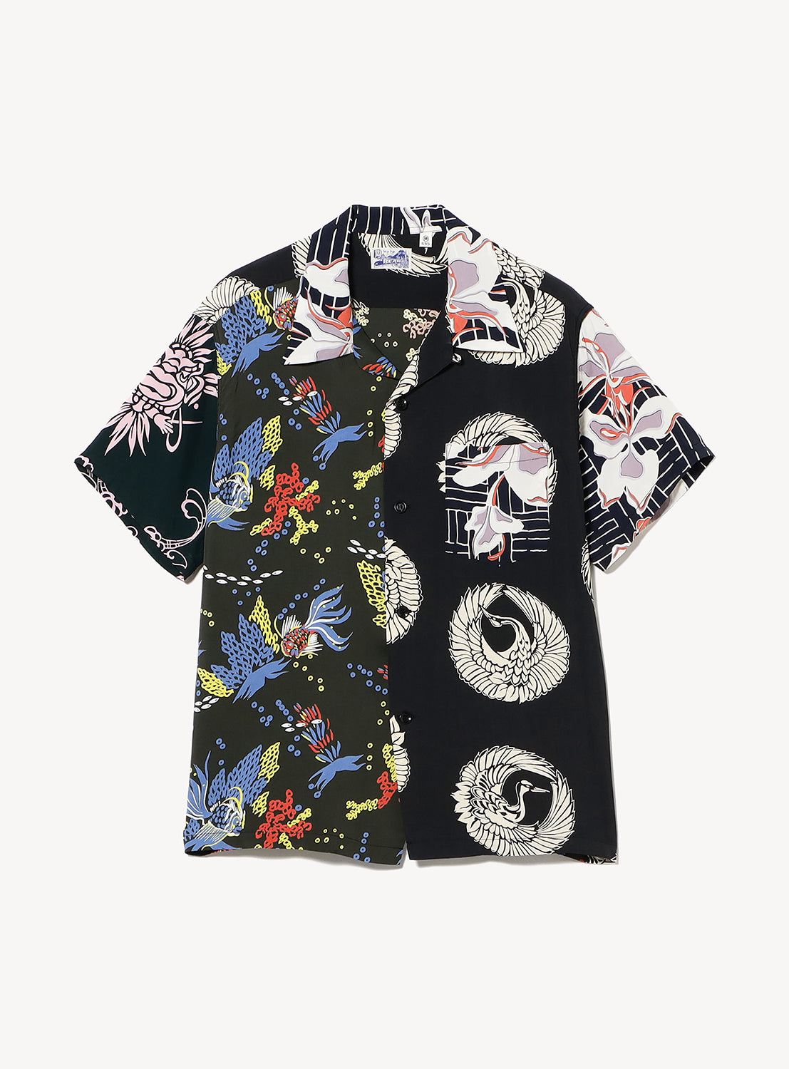 The SUN SURF Exclusive Patchwork Aloha Shirt 26SS features vintage inspiration with colorful birds and flowers on one side, and black-and-white cranes with abstract motifs on the other.