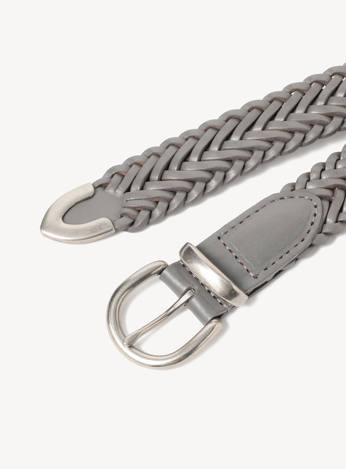 The BEAMS Vibrant Mesh Belt, featuring gray woven leather with a silver buckle and metal tip, is displayed on a white background.