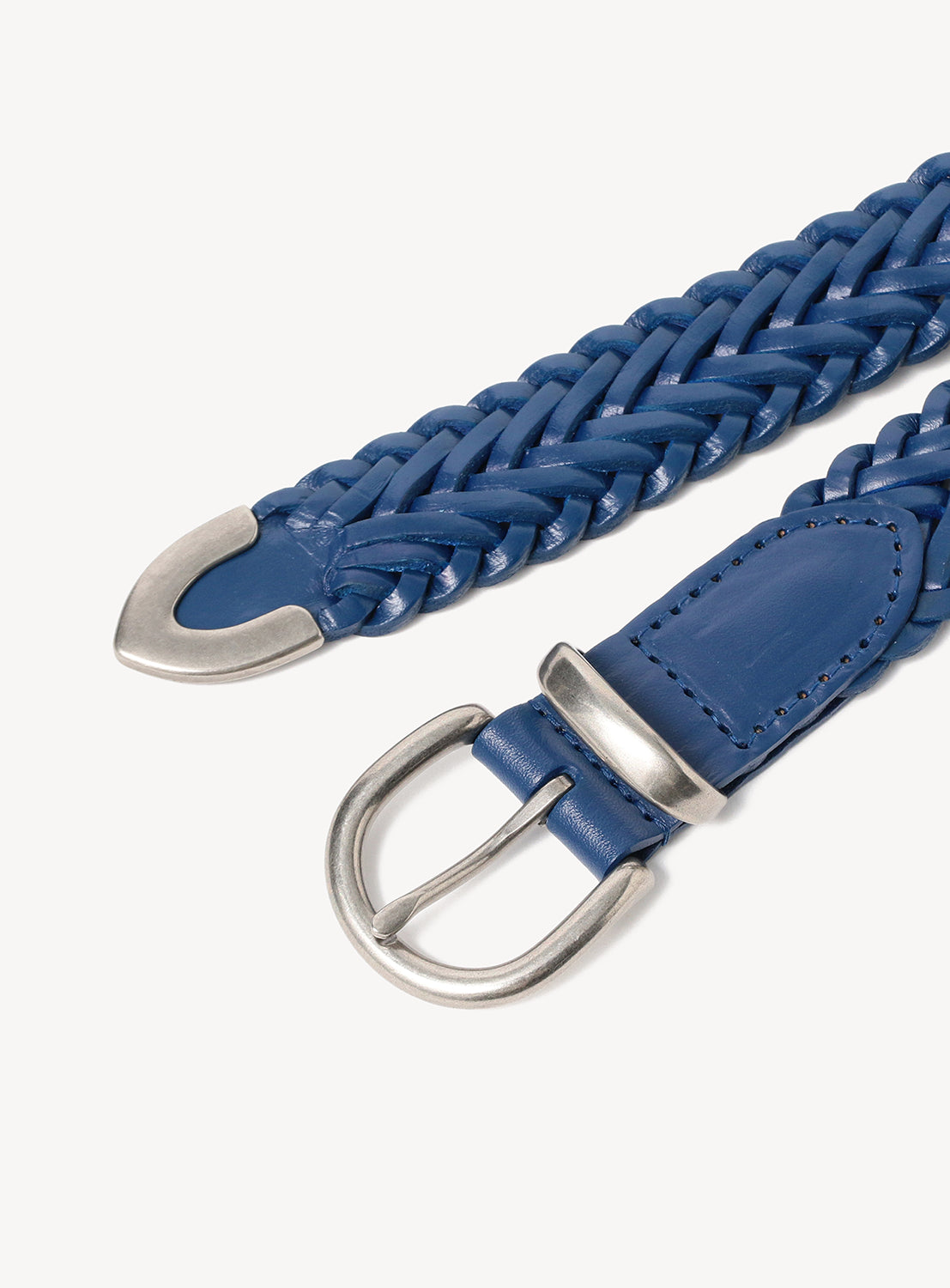 Blue braided belt with silver buckle on a white background