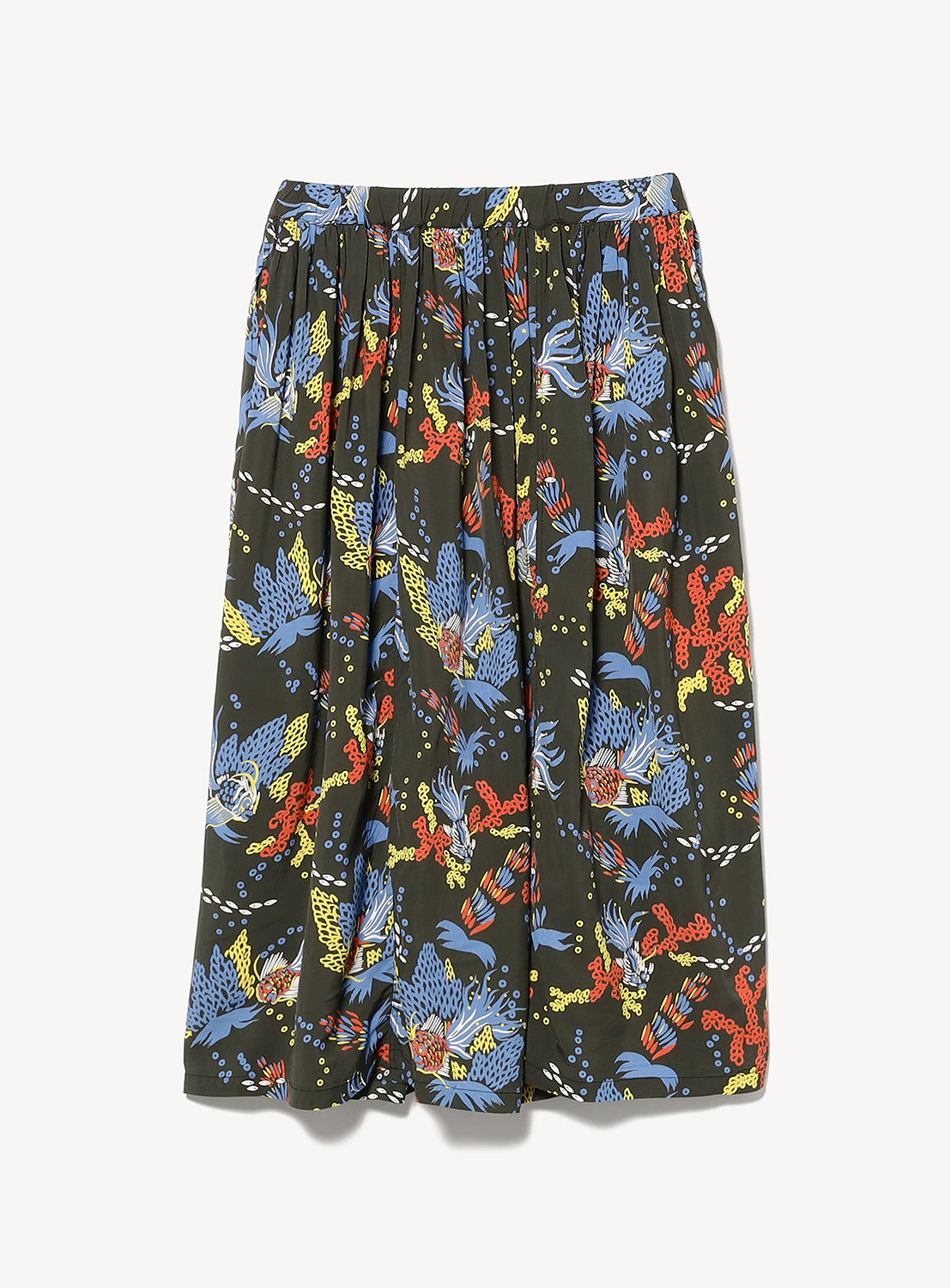 The [Exclusive] SUN SURF x BEAMS BOY Aloha Gathered Long Skirt by SUN SURF features a gathered waist, black base, and vibrant blue, red, and yellow floral prints inspired by vintage Hawaiian designs.