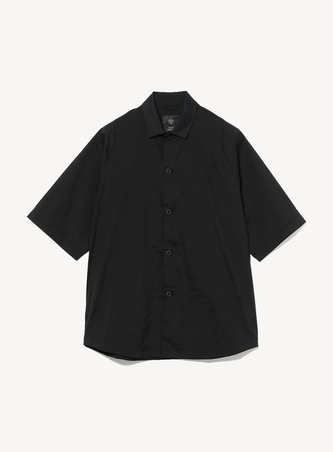 The TEATORA AQ Short Sleeve Cartridge Shirt is a black, collared button-up travel shirt with short sleeves, shown flat on a white background. Its wrinkle-resistant, quick-drying fabric makes it perfect for comfortable travel and easy packing.