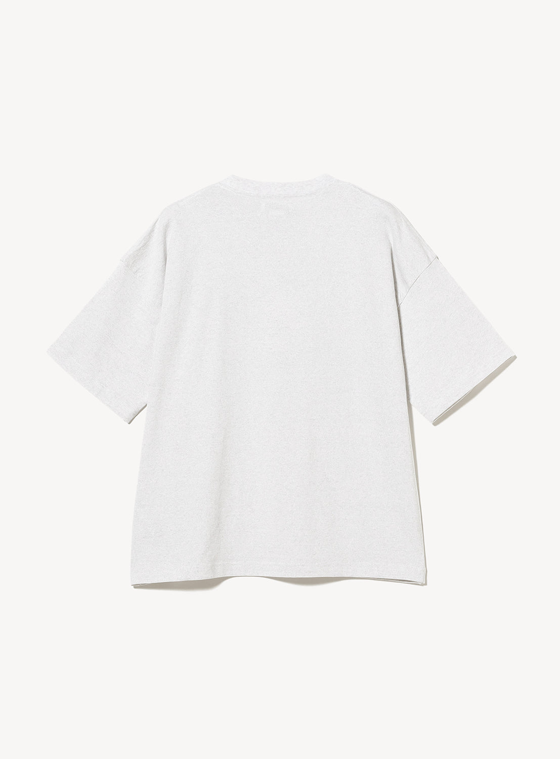 The TTT MSW Logo T-Shirt by TTT MSW is a plain white, short-sleeve tee made from 100% cotton, laid flat and shown from the back against a white background. It features a subtle Triple T logo for a clean, minimalist appearance.