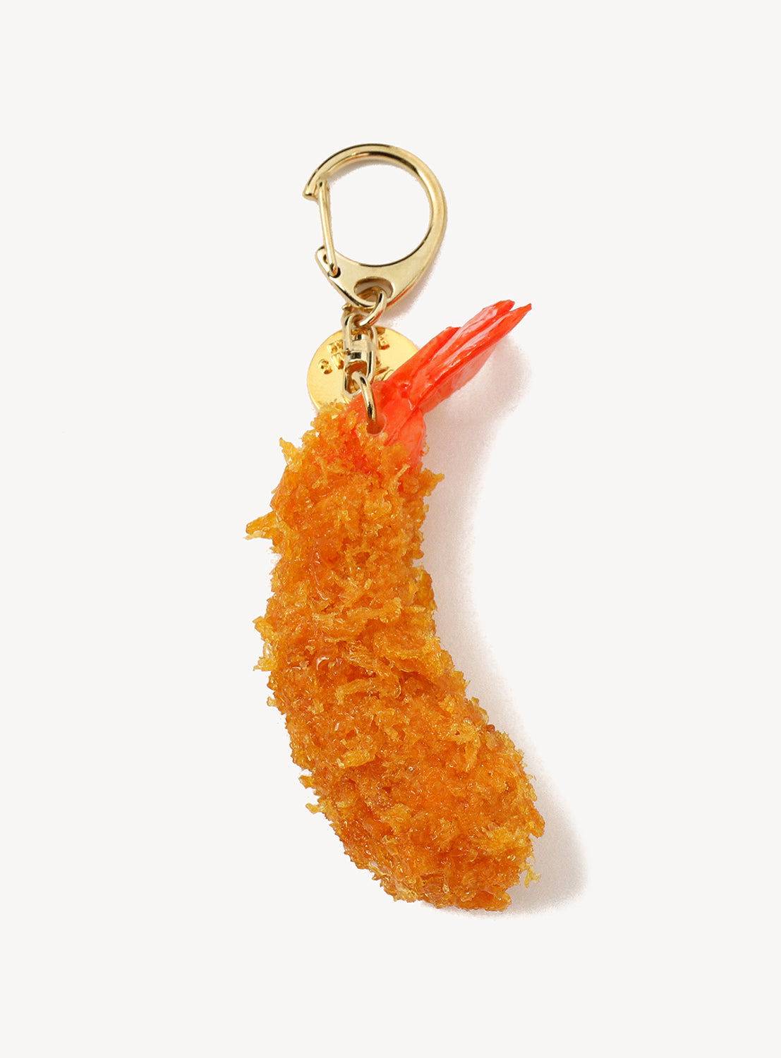 Shrimp-shaped keychain with a gold clasp on a white background