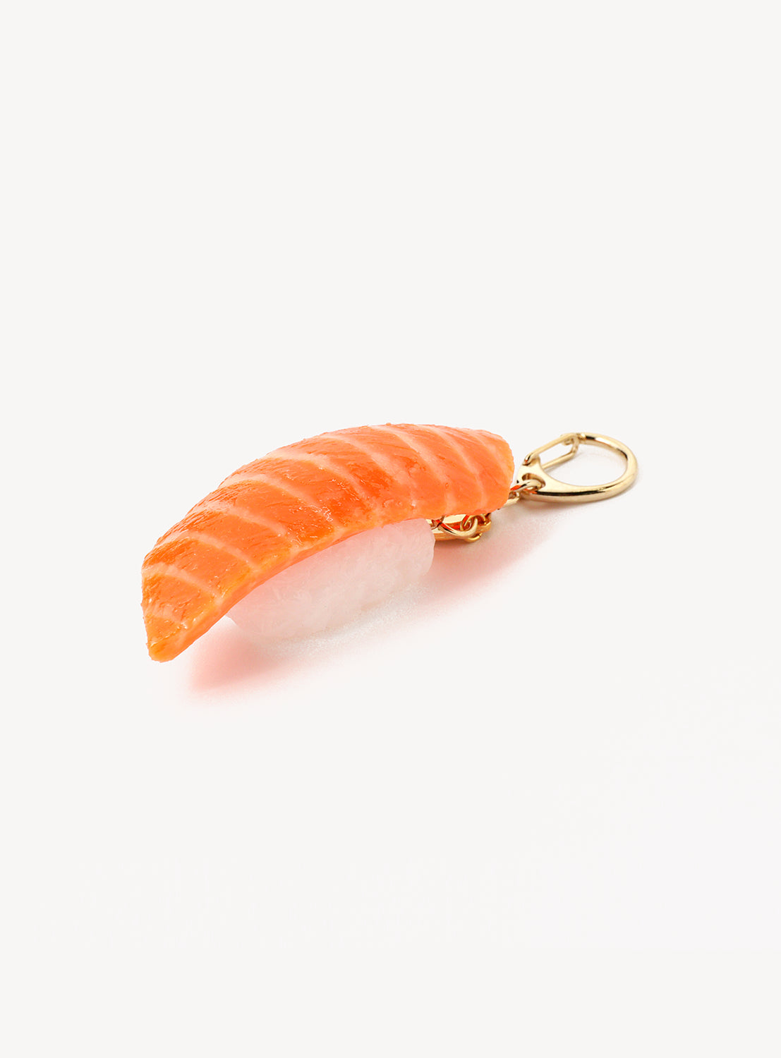 Sushi-shaped keychain with gold clasp on a white background