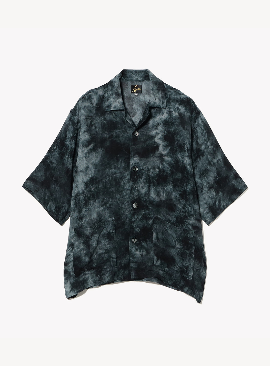 Front view of a short-sleeve open-collar shirt in a relaxed fit, featuring an all-over charcoal and black tie-dye pattern. Designed with a button-front closure, large patch pockets at the hem, and a straight silhouette for an effortless, resort-inspired look.