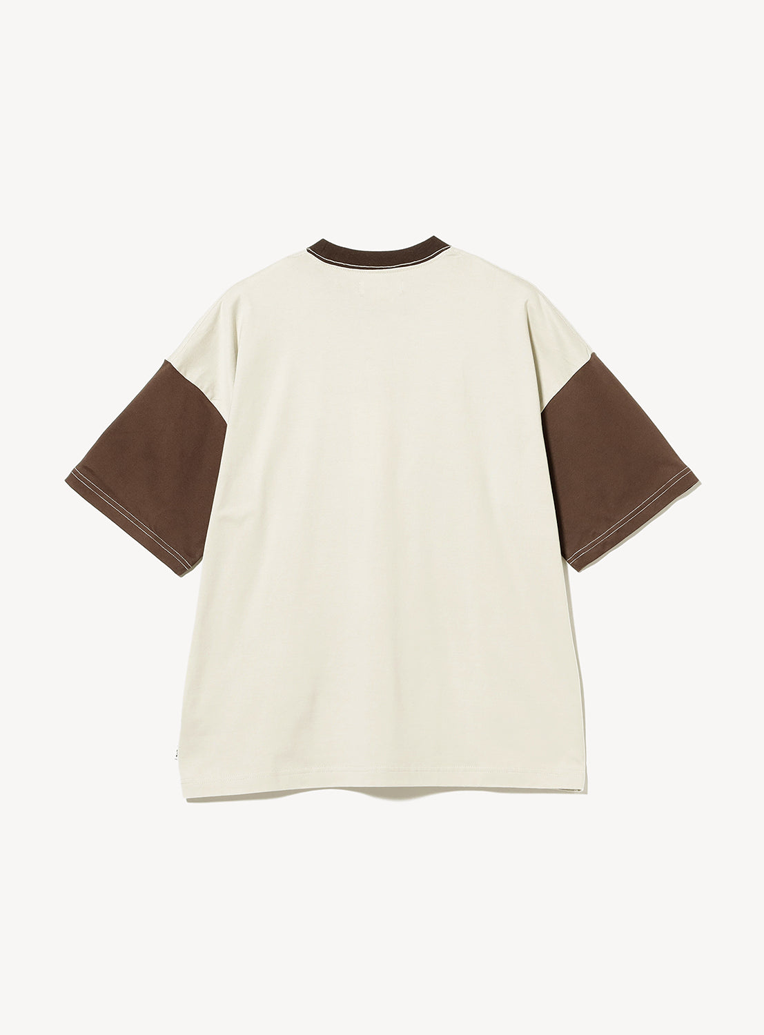 A back view of the TTT MSW Wave Logo Ringer T-Shirt—a beige short-sleeve style with dark brown sleeves, a matching brown crew neckline, and classic streetwear appeal.