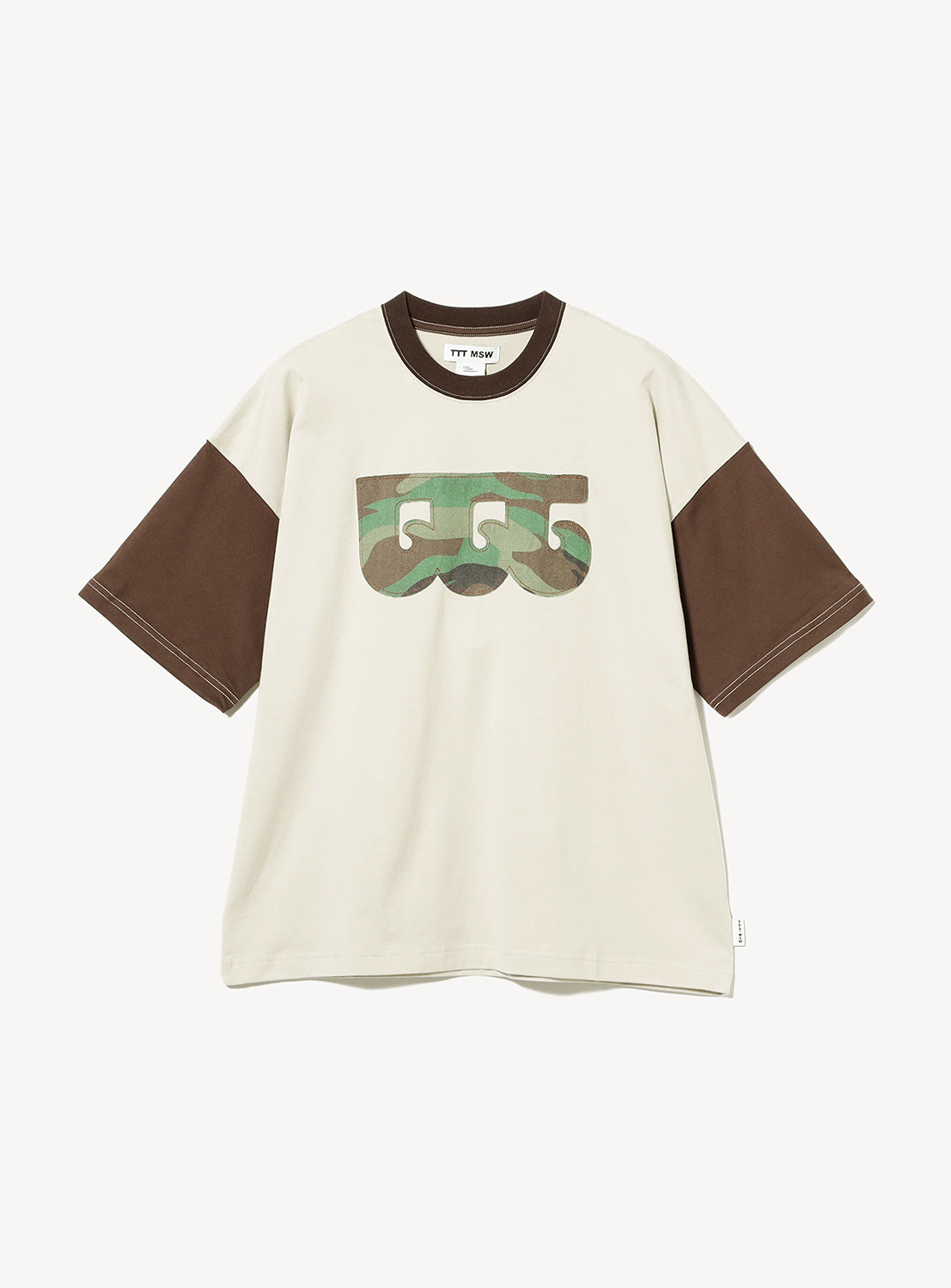 The Wave Logo Ringer T-Shirt by TTT MSW features a beige retro design with contrasting brown short sleeves and collar. Its front showcases a stylized wave-inspired abstract graphic resembling eyes, making it the perfect statement piece to add a distinctive streetwear edge to your wardrobe.