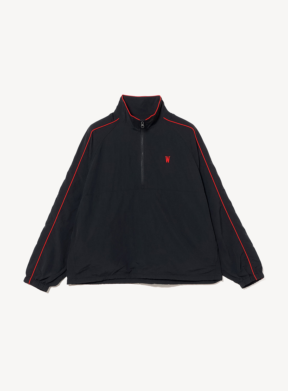 BEAMS T Tyrrell Winston - Anorak Jacket in black, featuring red piping along the sleeves and shoulders and a small red WIN SPORT logo on the left chest, displayed on a white background—a nod to classic vintage training wear.
