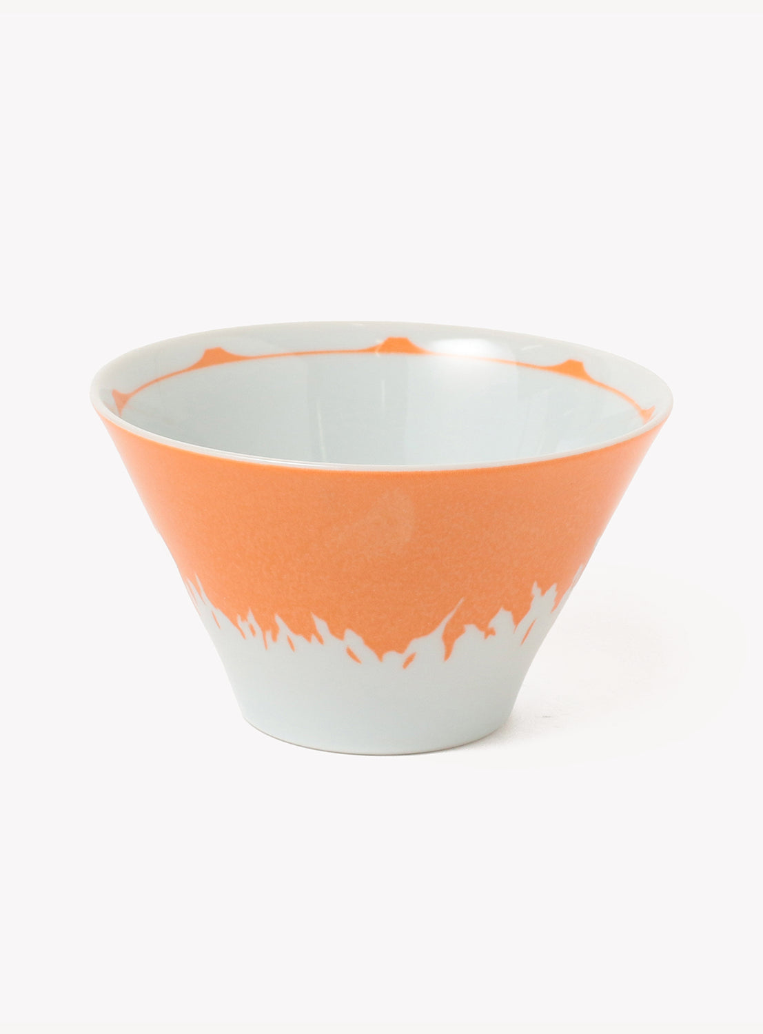 Ceramic bowl with orange interior and rim on a white background