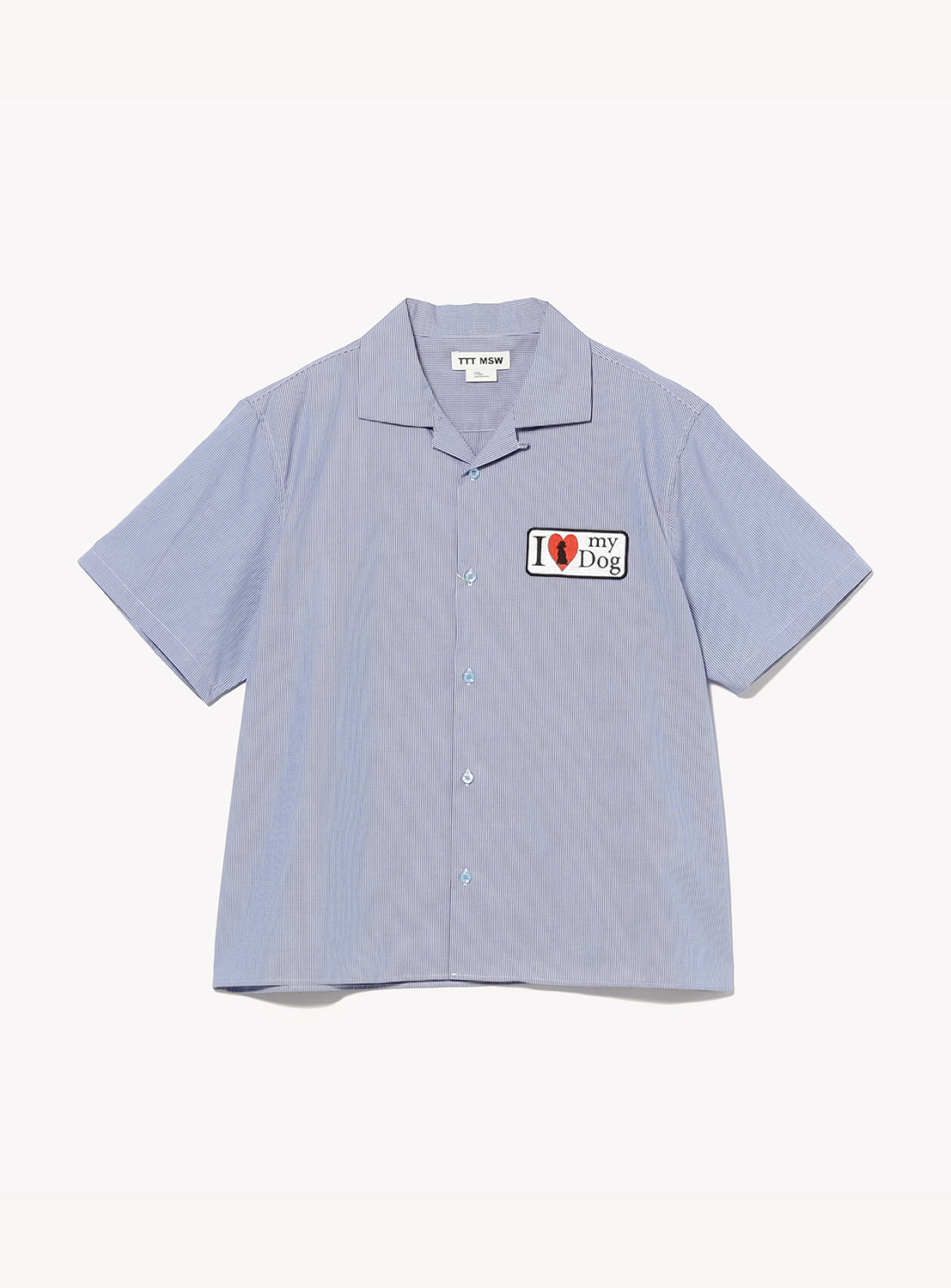 The I Love My Dog Half Sleeve Shirt by TTT MSW is a light blue, short-sleeve button-up featuring a patch on the left chest with the text "I ❤️ my Dog." This shirt showcases a modern silhouette, relaxed fit, and classic collar for effortless style.
