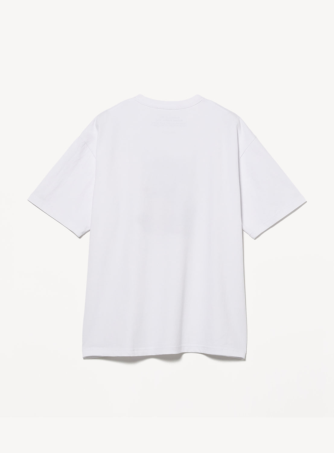 The FACE Graphic T-Shirt by BEAMS T is shown from the back against a white background, with no visible designs or logos—a classic style from the BEAMS T collection for the brand’s 50th anniversary.