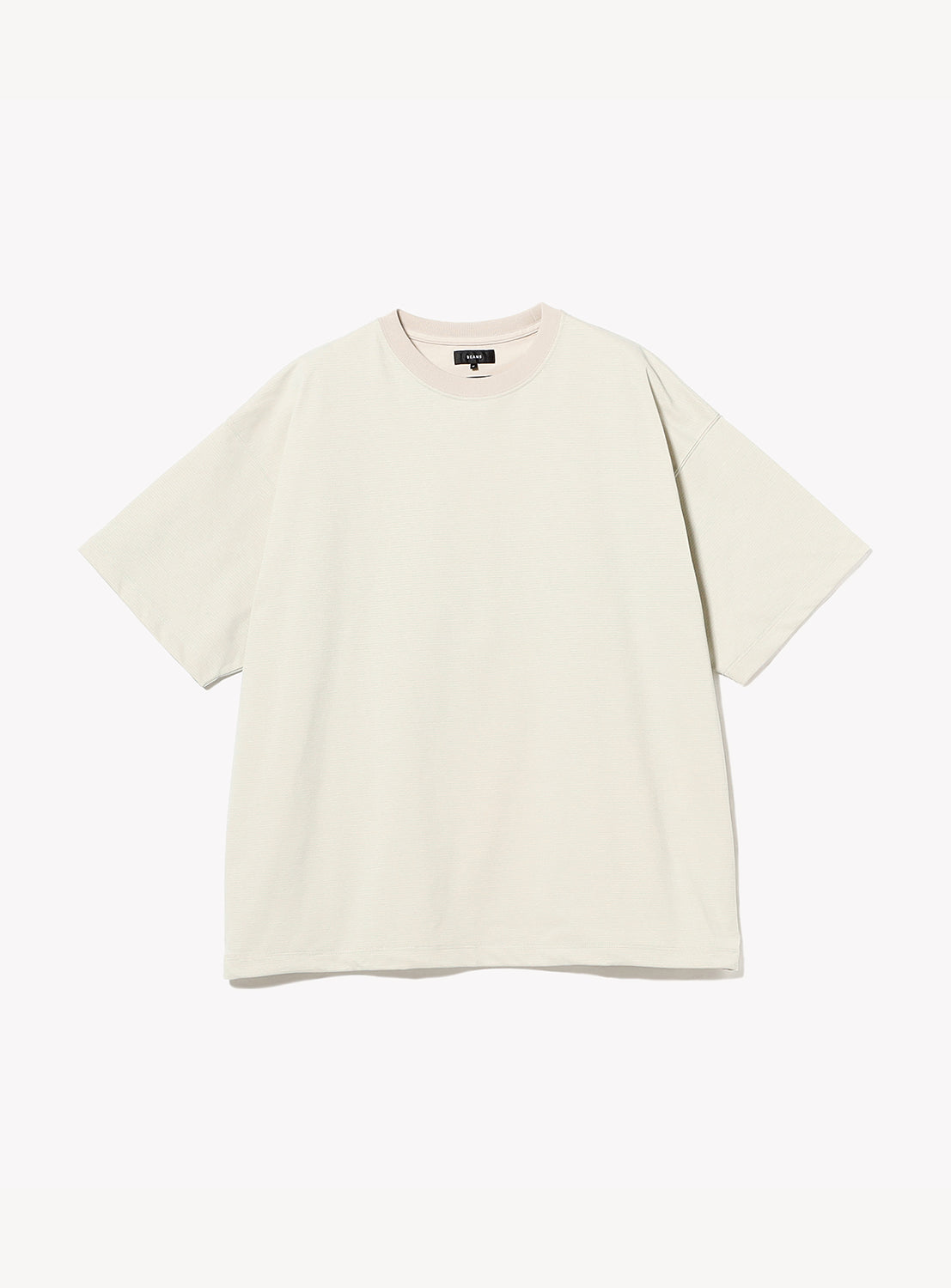 The BEAMS Micro Stripe Wide Fit T-shirt is displayed laid flat on a white background. This short-sleeved, off-white tee features an oversized fit with subtle micro stripes, a simple crew neckline, and no visible patterns or logos.