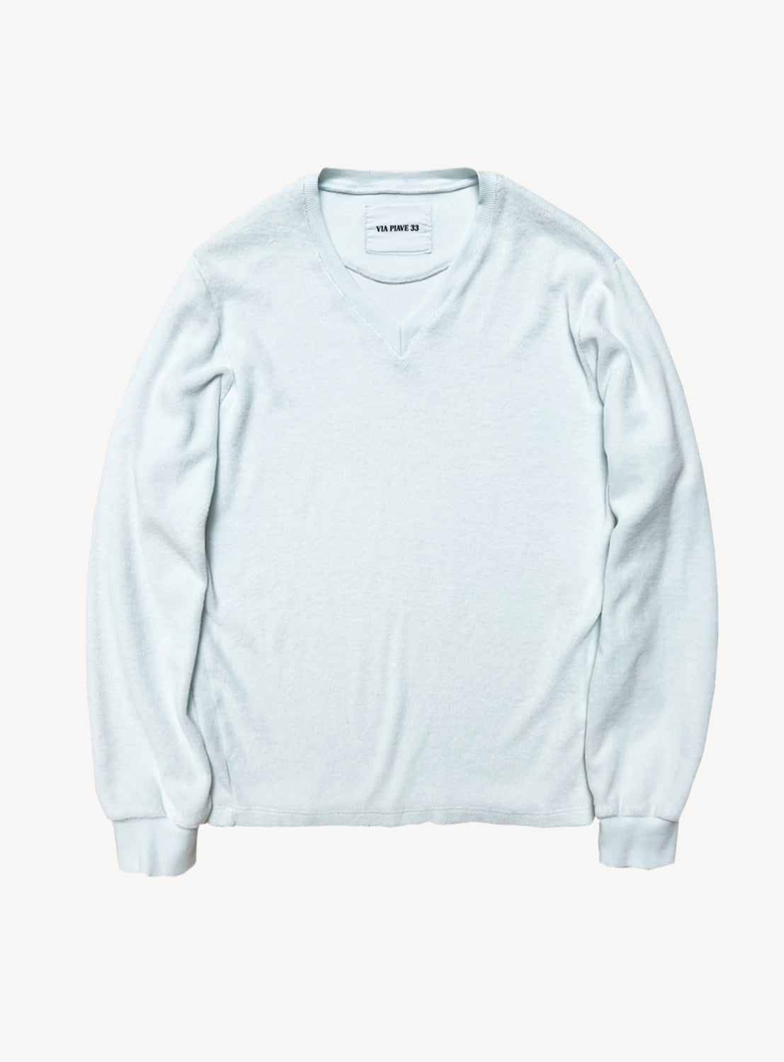 The VIAPIAVE33 Sponge V-Neck is a light blue, long-sleeve knit sweatshirt with a classic V-neck design, laid flat on a white background—an essential addition to any wardrobe.