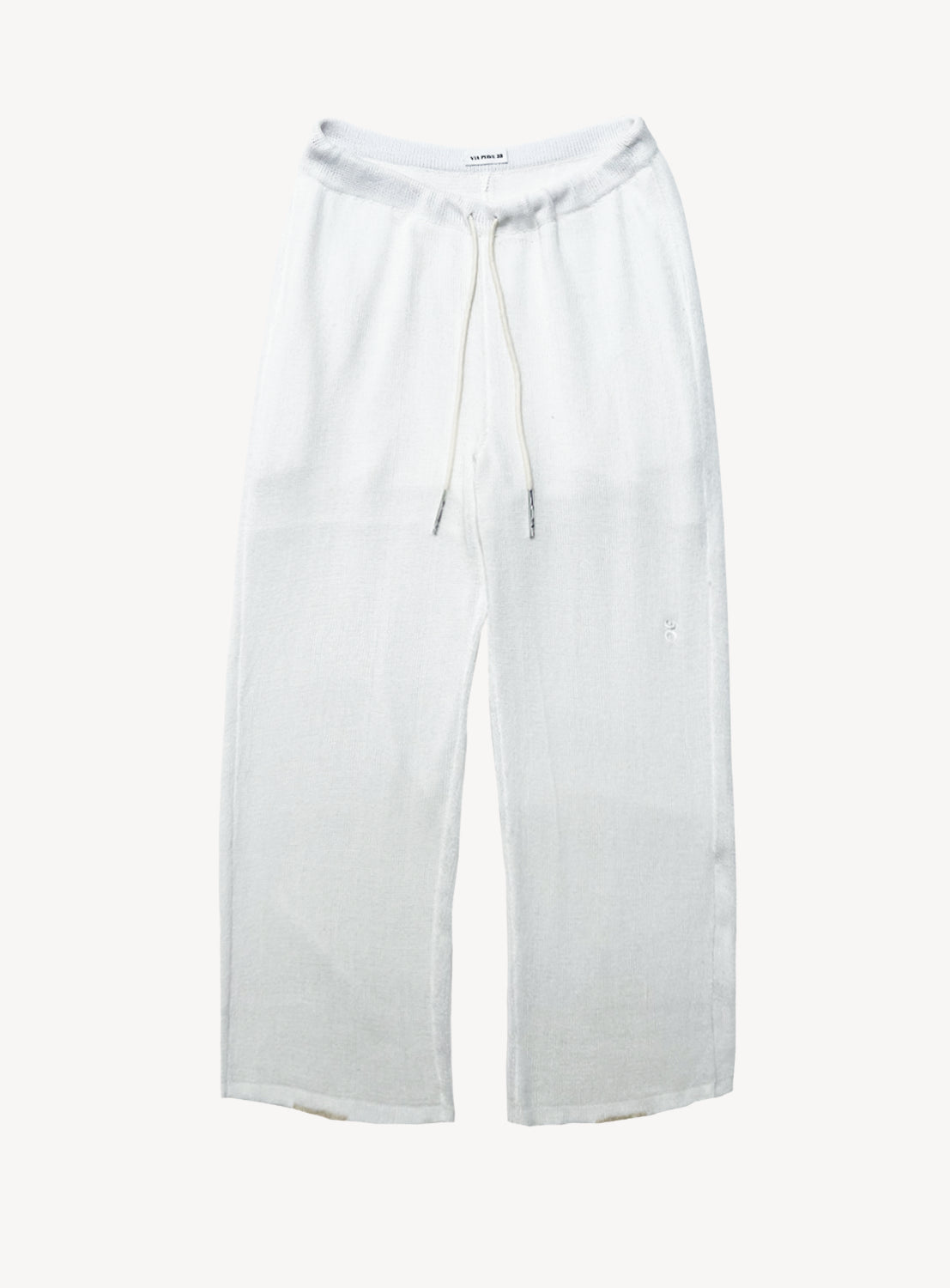 Rete Sport Pant by VIAPIAVE33—wide-leg white linen pants with a relaxed fit, featuring an elastic waistband and drawstring closure, crafted from lightweight fabric and shown laid flat on a white background.